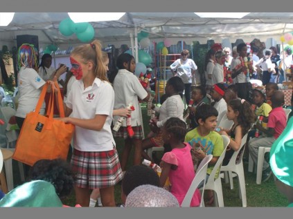 Giving back... Redhill pupils spoil the children of Choc.