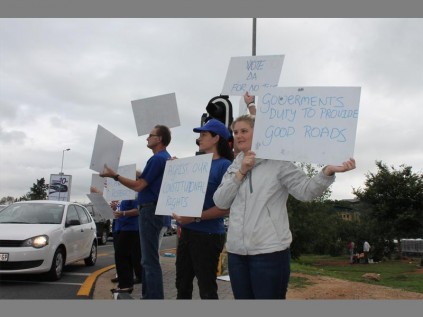 SAY NO: Protesters brandish placards condemning e-tolls.