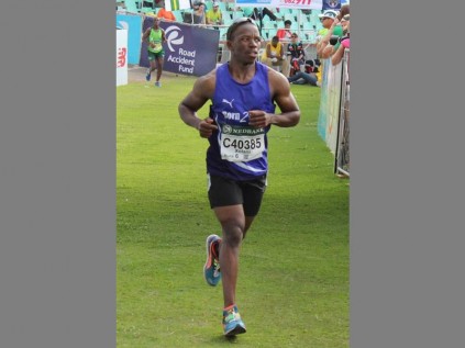 Inspiration… Xolani Hlatshwayo, who is raising funds for the Starfish Foundation, finishes the race.