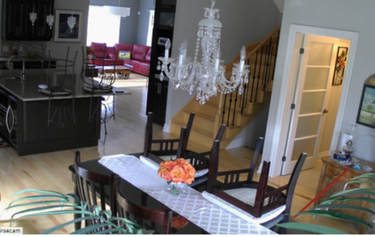 Video footage of a dining room as posted on the website.
