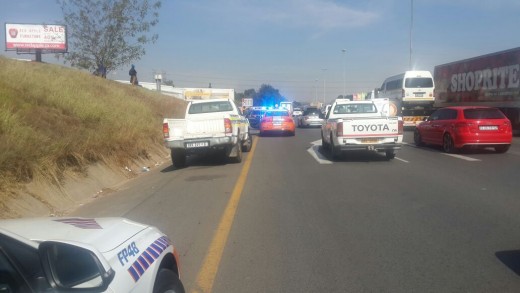 BACKED UP: Traffic backed up on Grayston Drive while police investigate the scene of a shootout.