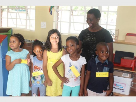 Happy… Grade R teacher, Dorah Nkwane, with some of her new Buccleuch Primary School Grade R pupils.
