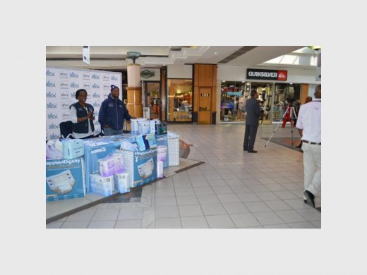 Joburg Water employees with some of the donated nappies for its campaign.