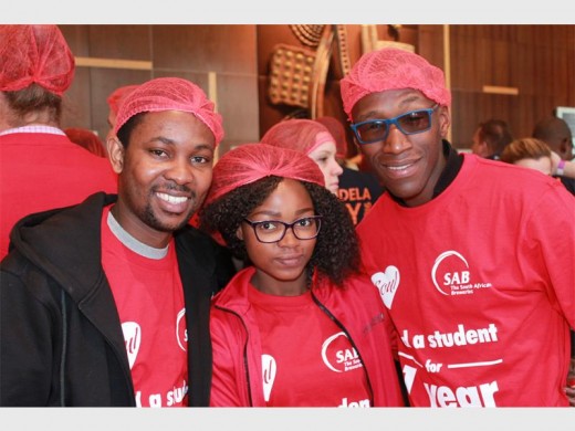 Ready to pack... South Africa Breweries employees Lucas Phaswana, Thabile Mgidi and Edwin Nkosi.