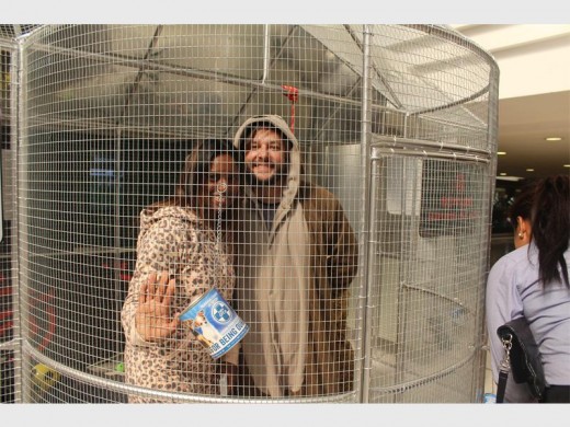 Radio personalities Sureshnie Rider and Roger Goode spend the day locked up in a cage to create awareness for wild animals in captivity.