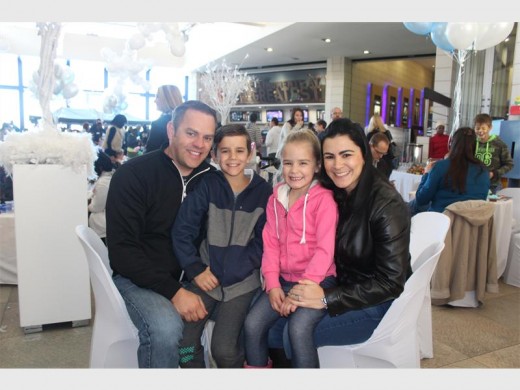 BONDING: Brendon Nell with his son, Cuan; daughter, Alexa; and wife, Nikki, at the Winter Wonderland-themed event.