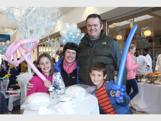 SMILES ALL ROUND: Heather Williamson with her mother Shelley, father Bruce and brother Rowan have a blast at the event.