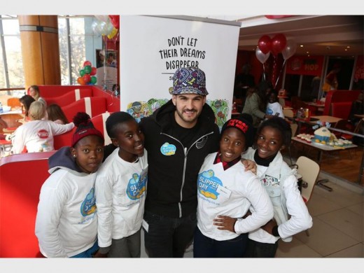J Something (Joao da Fonseca) from Micasa with children from Reach a Dream.
