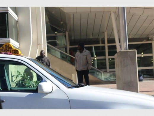 Residents claim that meter taxi drivers are threatening Uber drivers and their passengers.