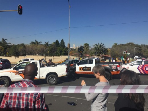 The crime scene was full of paramedics, tow trucks and residents who were horrified by the bloody scene on Republic Road.