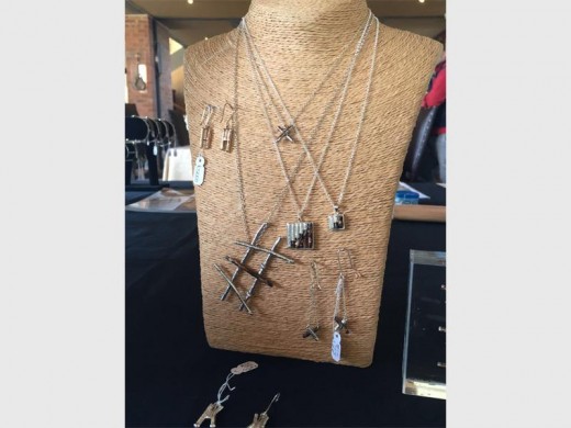 RECLAIMED: Some of the Legacy Collection pieces are covered with gold and silver, while others show the raw rusted metal from the Robben Island fence.