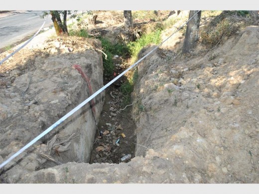 A trench that can cause injury to park users.