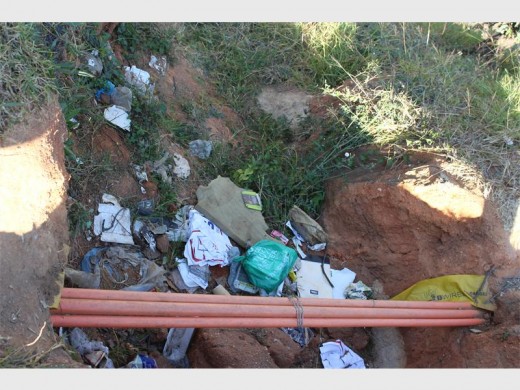 The embankment on the side of William Nicol Drive has collapsed, making it difficult for pedestrians.