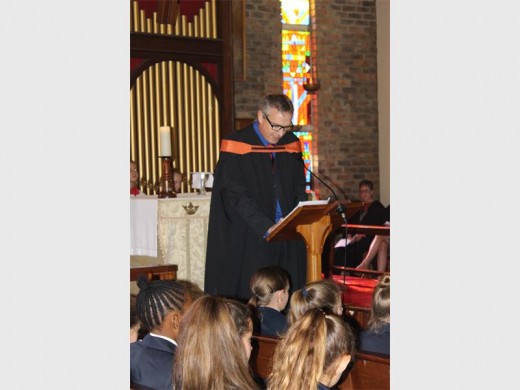 Darrel Webb, the headmaster of St Peter's Girls Prep, addresses pupils during the celebratory Eucharist.