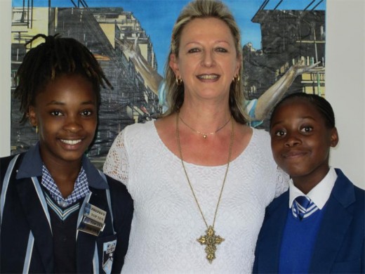 Nonhlanhla Tshabalala and Lerato Mongaula are welcomed to the Saints family by Ivanka Acquisto, head of St Stithians Girls' College.