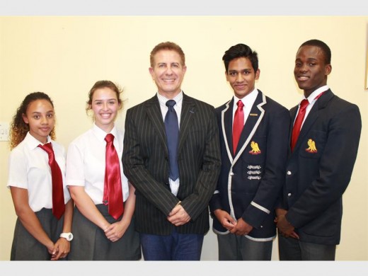Kamillah Eichhorn, deputy head girl; Mia Hancock, head girl; Manolis Vogiatzis, headmaster; Arkeev Rohit, head boy; and Audrey Mutwale, deputy head boy.