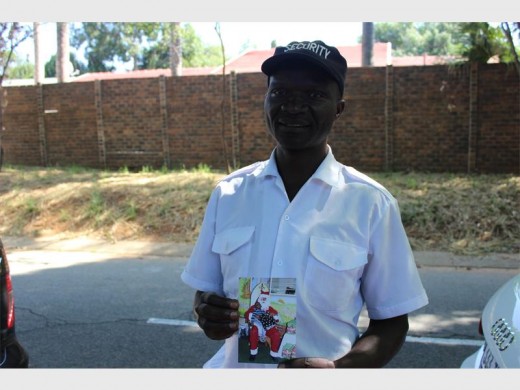 Freddy Ndaba proudly holds up his favourite picture of his son, Bradley.