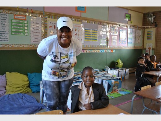 Lerato Sebesho and her son Nic on the first day of school at Montrose Primary School.