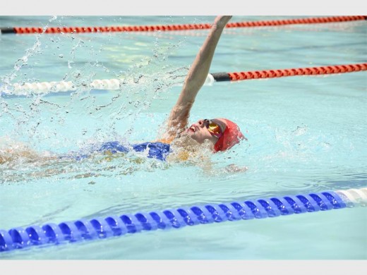 Loghan Gray achieves a brilliant time for backstroke in his school gala.