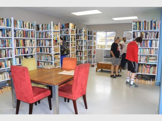 People browse through books at the new bookstore.